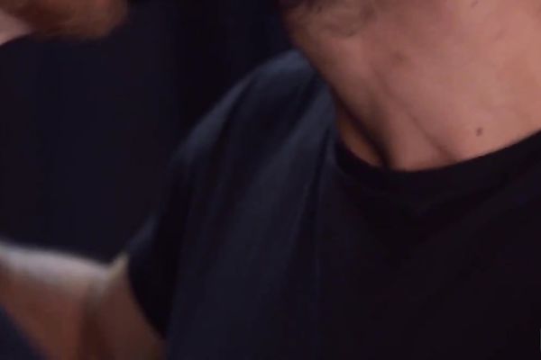 Their passion is palpable as they kiss and caress each other's bodies